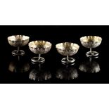 Property of a lady - a set of four unmarked white metal (test silver) salts modelled as leaves, each