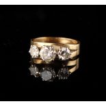 Property of a lady - a Dutch unmarked yellow gold (tests 14-18ct) diamond three stone ring, the