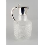 Property of a lady - a late Victorian silver mounted cut glass claret jug, makers Horace