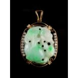 A 14ct yellow gold carved jadeite & diamond oval pendant, the jadeite carved as flowers & fruit,