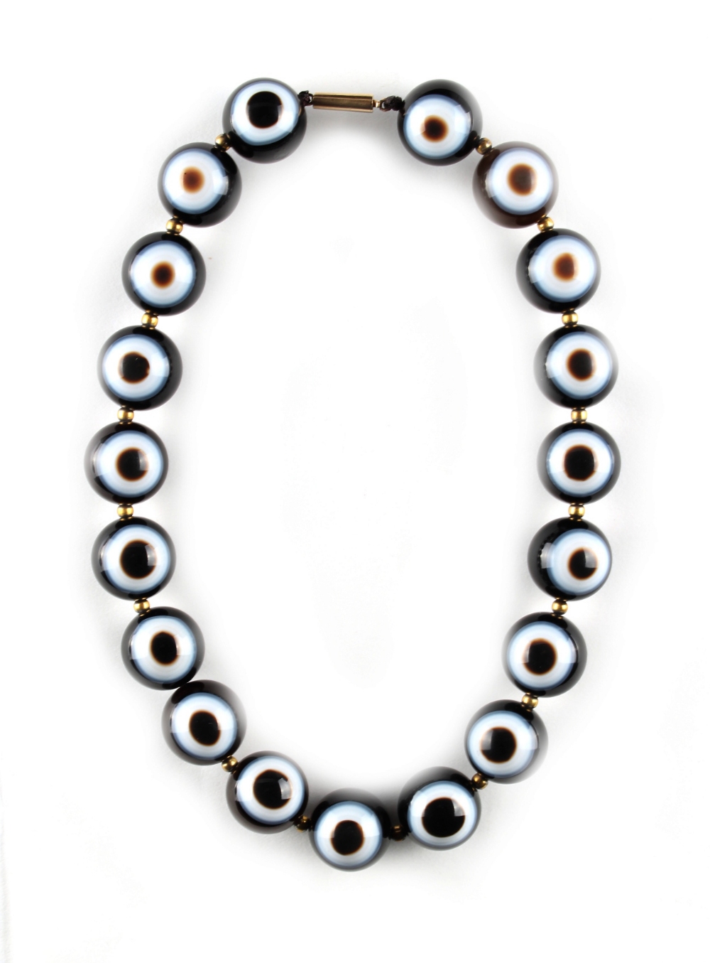 An 'eye' agate bead necklace, the nineteen uniform beads each approximately 20mm diameter, 18. - Image 2 of 2