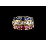 An 18ct yellow gold multi gem set ring, pave set with three rows of seven each graduated rubies,
