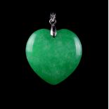 A Chinese carved jadeite heart shaped pendant, 1.2ins. (3cms.) long (excluding suspension) (see