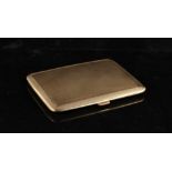 Property of a lady - a 9ct gold cigarette case, with engine turned decoration, engraved presentation