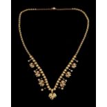 A Victorian unmarked yellow gold (tests 14-18ct) seed pearl necklace, with pearl set links & pearl