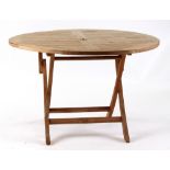 Property of a lady - a Cotswold Collection teak circular folding garden table, 47.25ins. (120cms.)