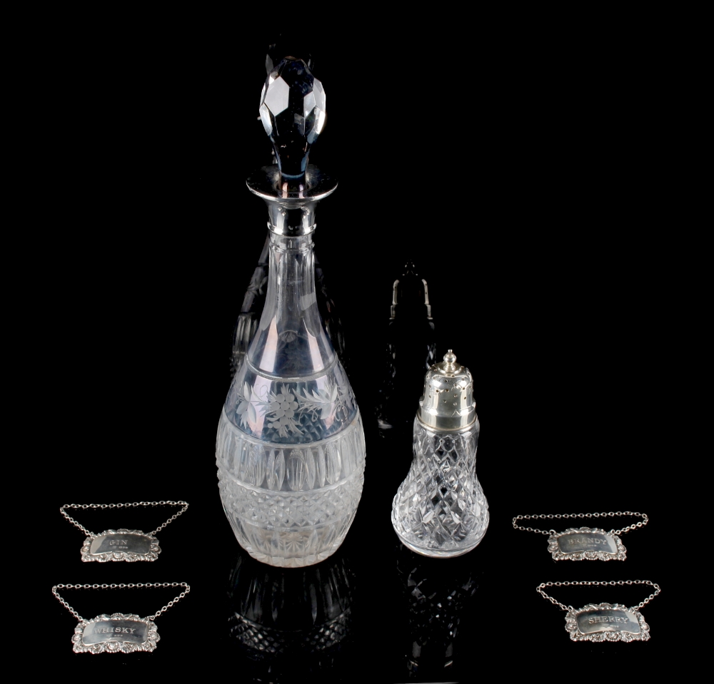 Property of a deceased estate - a cut glass decanter with silver collar, 15ins. (38cms.) high (