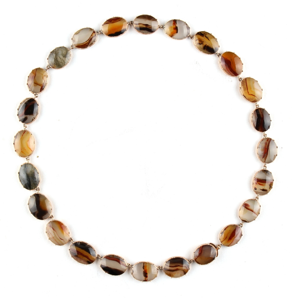 An unmarked Georgian gold agate panel necklace, the oval banded agate panels each approximately 15mm