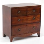 Property of a gentleman - a small 19th century mahogany chest of two short & two long drawers, 31.