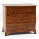 Property of a gentleman - an Edwardian oak dressing chest base, with three long drawers, on swept