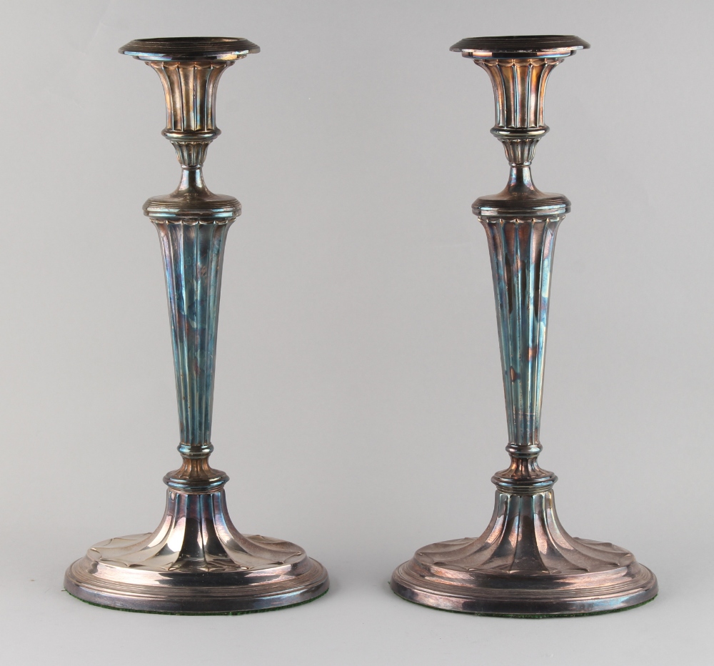 Property of a lady - a pair of Georgian Old Sheffield Plate neo-classical candlesticks, of fluted