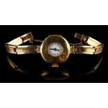 Property of a deceased estate - an early 20th century lady's 18ct gold wristwatch on 18ct gold