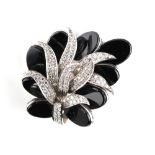 A good white gold black onyx & diamond floral brooch, probably 1970's, with black onyx oval panels &