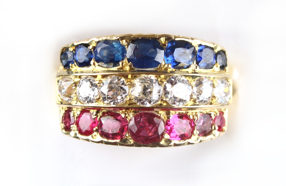 An 18ct yellow gold multi gem set ring, pave set with three rows of seven each graduated rubies, - Image 2 of 3