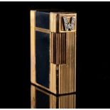Property of a lady - a S J Dupont gold plated black 'Laque de Chine' lighter, with diamond set