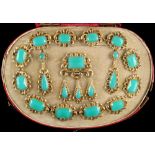 A Victorian yellow metal & chrysoprase parure, comprising a panel necklace, a matching brooch, and a