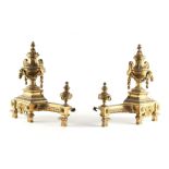 Property of a lady - a pair of late C19th French ormolu fender ends or chenets, with swag