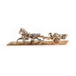 An unusual 15ct yellow gold & diamond brooch modelled as a trotting horse & cart, set with rose