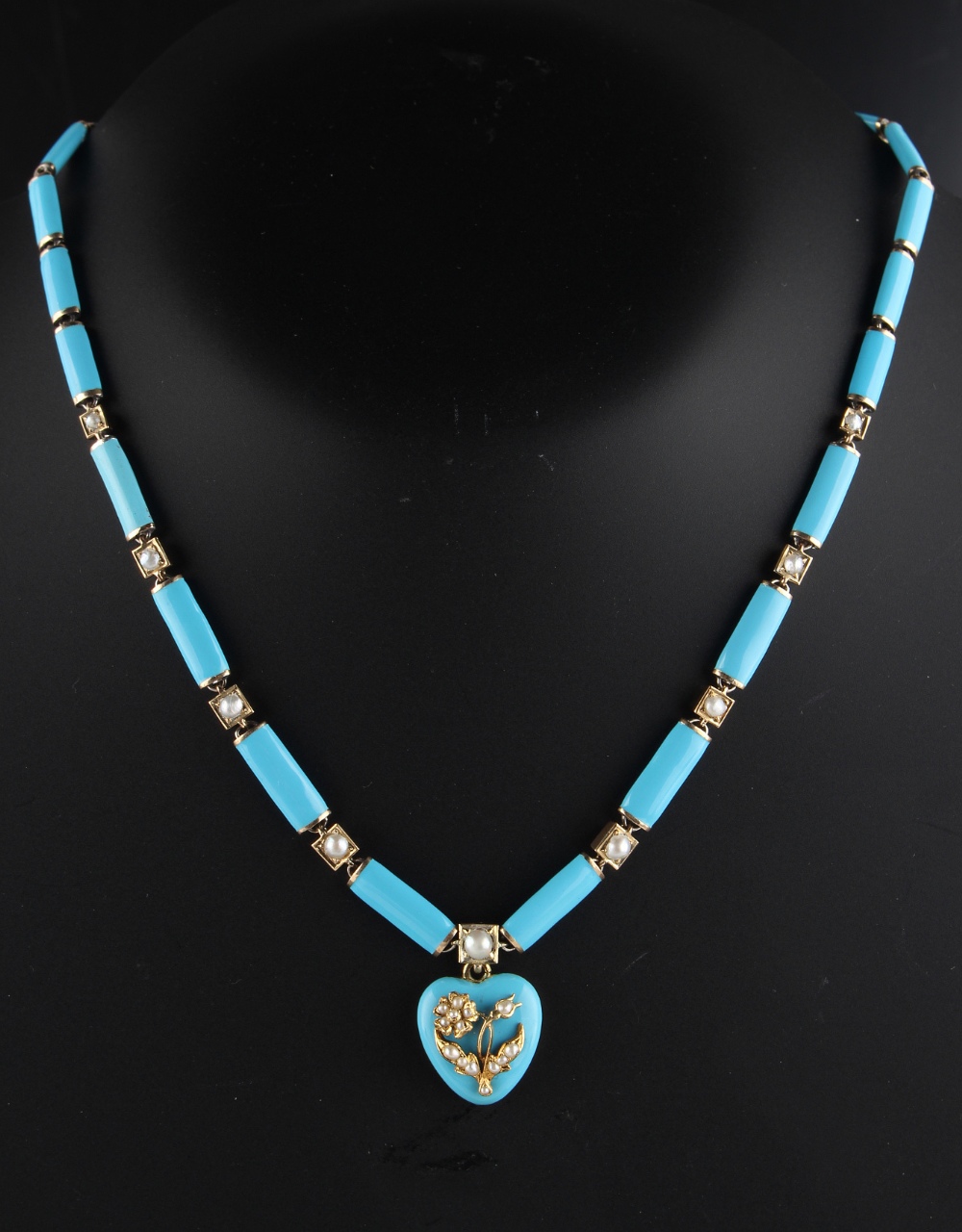 A late Victorian pale blue enamel & seed pearl necklace with pendant heart shaped locket, the locket