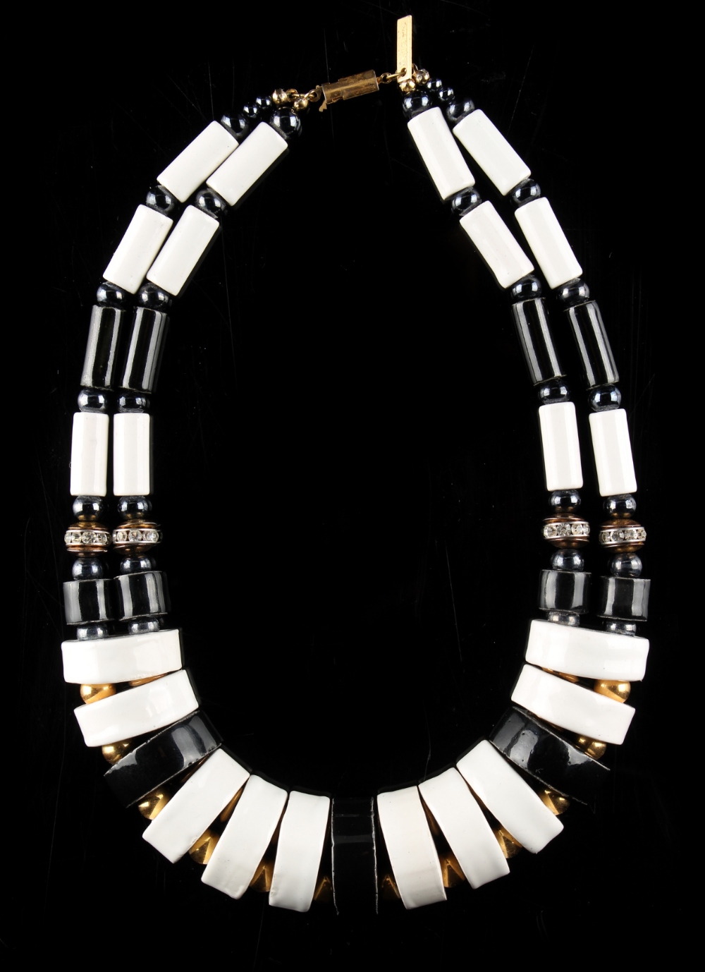 A modernist style alternating black & white ceramic link necklace, with gilt ball & paste set