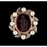 An oval intaglio brooch depicting a standing classical maiden, in 9ct white gold diamond & pearl