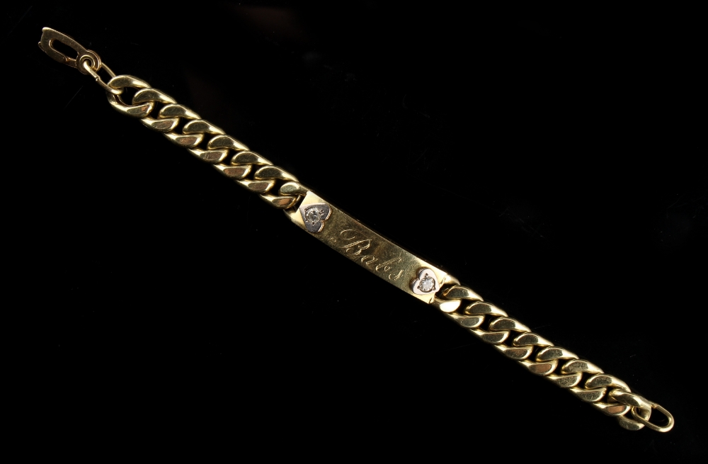 Property of a lady - a Dutch unmarked yellow gold (tests 14-18ct) identity bracelet with two