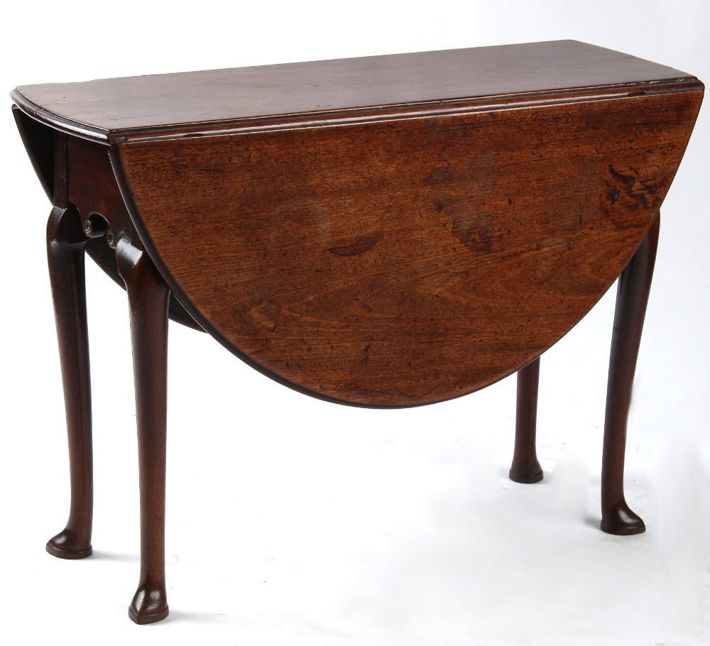 Property of a deceased estate - a mid 18th century George II mahogany oval drop-leaf table with