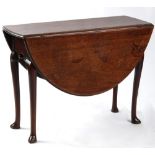 Property of a deceased estate - a mid 18th century George II mahogany oval drop-leaf table with