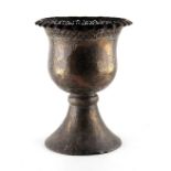 Property of a gentleman - a 19th century Islamic brass vase, 12.8ins. (32.5cms.) high (see