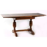 Property of a lady - an oak draw-leaf dining table (see illustration).