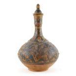 Property of a deceased estate - an Islamic cold painted terracotta pottery bottle vase & cover, late