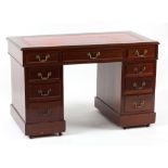 Property of a gentleman - an Edwardian mahogany twin pedestal desk with red leather inset top