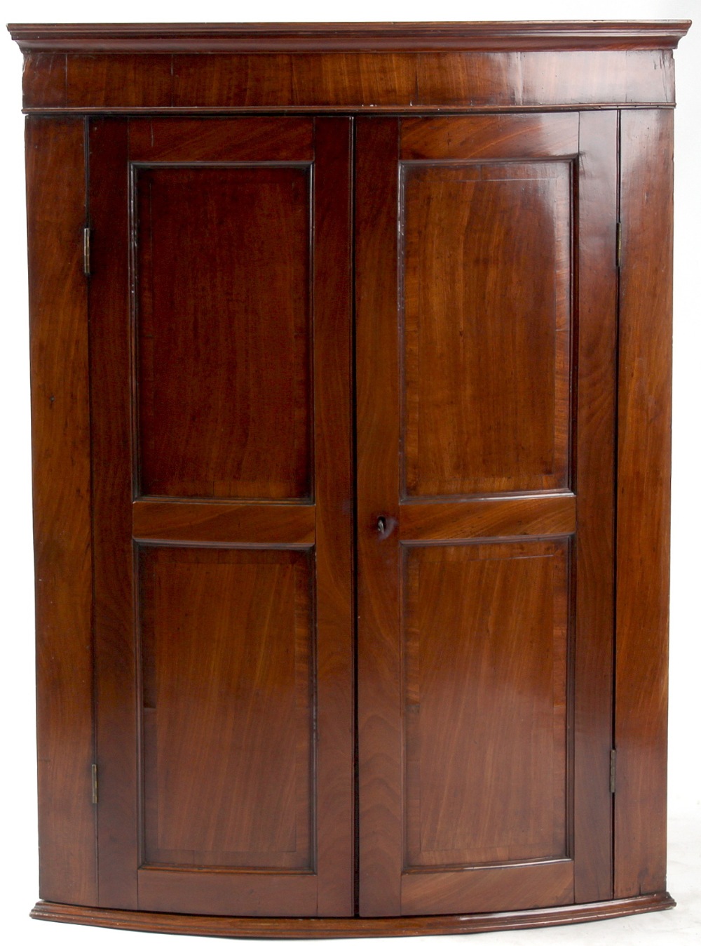 Property of a deceased estate - a George III mahogany bow-fronted two-door corner wall cabinet,