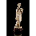 Property of a gentleman - a large Japanese carved ivory okimono depicting a bijin, Meiji period (