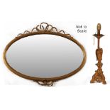 Property of a deceased estate - a gilt painted oval framed wall mirror with ribbon cresting &