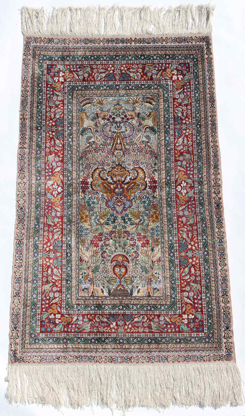 Property of a lady - a fine quality silk prayer rug, 49 by 29ins. (125 by 74cms.) (see