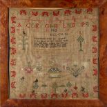 Property of a lady - an early 19th century animals & flowers sampler, dated 1806, in glazed frame,