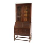 Property of a deceased estate - an oak bureau bookcase with glazed upper section, second quarter