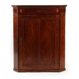Property of a lady - a George III oak & inlaid corner wall cabinet, 37.4ins. (95cms.) high (see