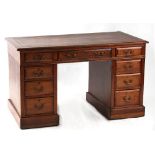 Property of a deceased estate - a small Edwardian twin pedestal desk with brown leather inset top