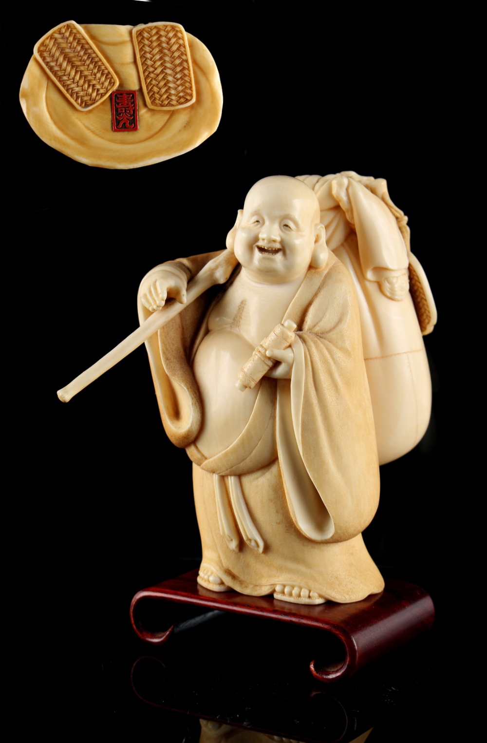 Property of a gentleman - a Japanese carved ivory okimono depicting Hotei, Meiji period (1868-1912),