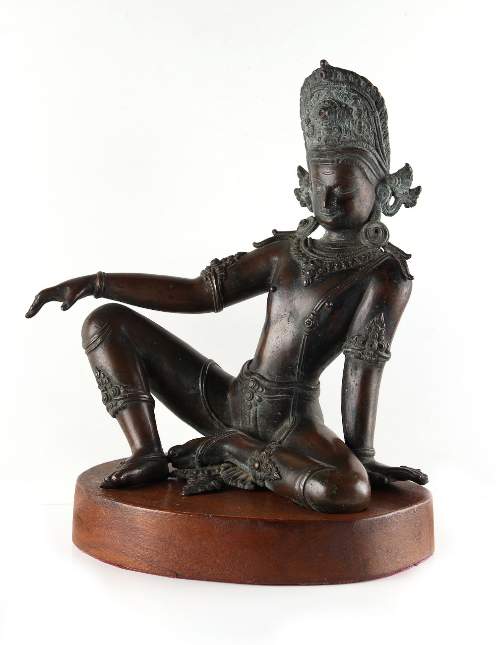 A bronze figure of Avalokita Chittravishrama, Nepal, 18th century or earlier, modelled seated in