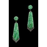 A pair of Art Deco style unmarked white gold or platinum & carved jadeite pendant earrings, with