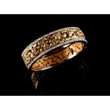 A good quality late 19th / early 20th century yellow & rose gold diamond hinged bracelet, probably