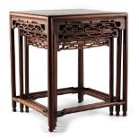 A nest of three Chinese hongmu stands or occasional tables, late 19th / early 20th century, with