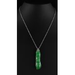 A very fine certificated untreated Chinese carved apple green jadeite pendant modelled as a bean