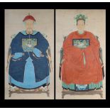 A pair of Chinese ancestor paintings on paper, 19th century, unframed, the paintings 64.15 by 35.