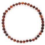 A good certificated amber bead necklace, the forty large individually strung Burmese amber beads