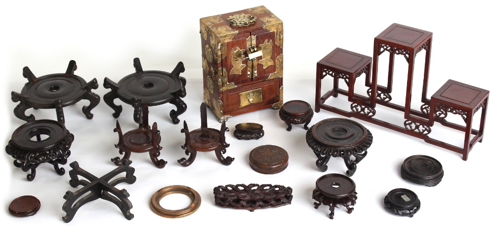 A Chinese brass mounted hardwood jewellery cabinet, early / mid 20th century, 10ins. (25.4cms.)