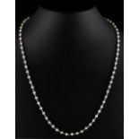 An 18ct white gold & pearl chain link necklace, the seventy-six untested pearls each approximately